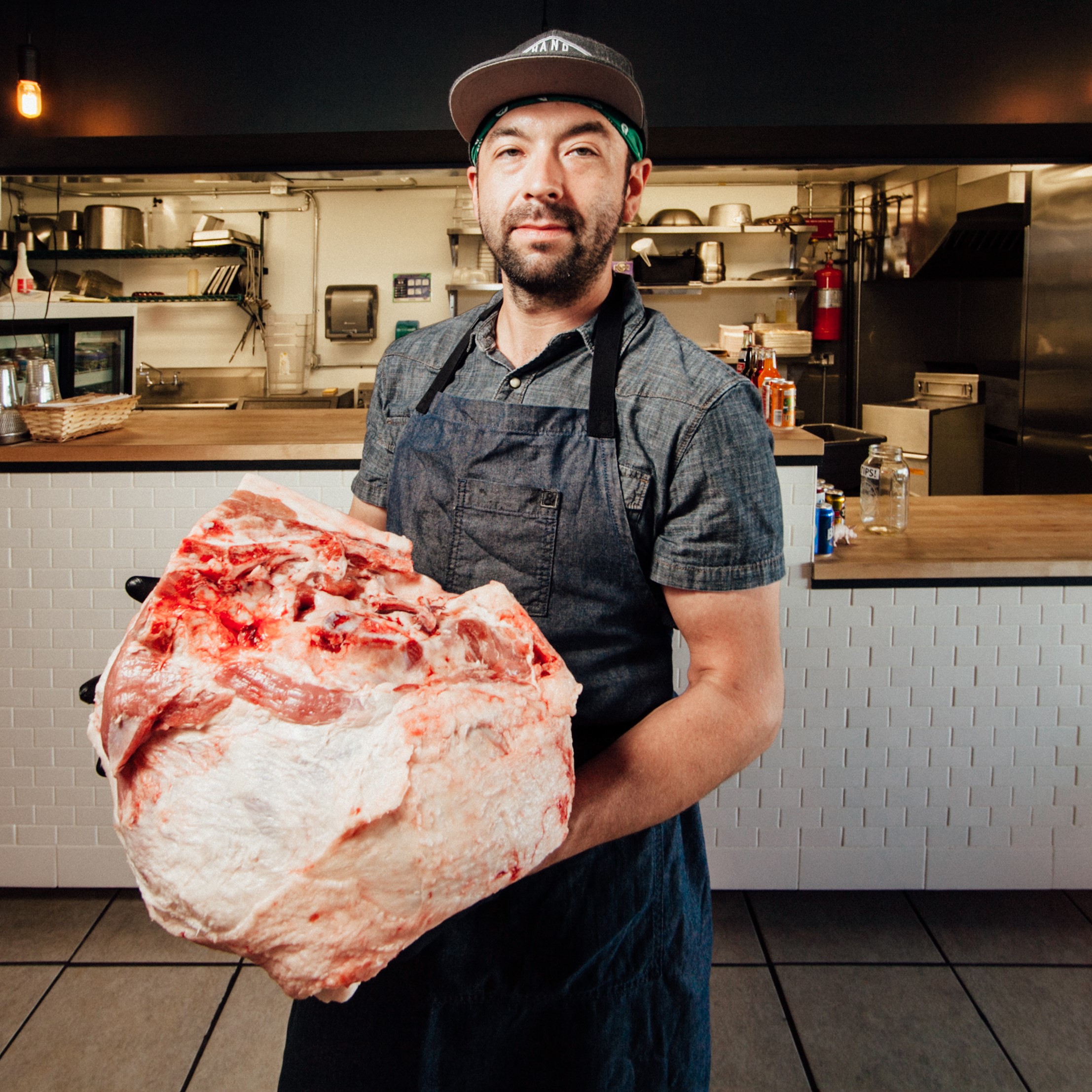 Meisel-18 sq Lee Meisel holding large ham